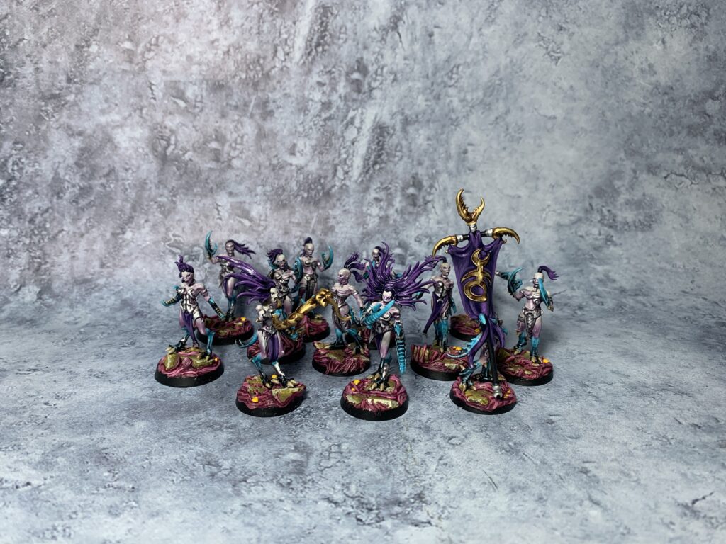 Daemons of Slaanesh in sea blue and pink colours