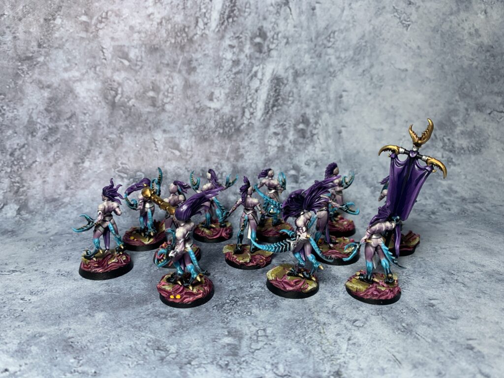 Daemons of Slaanesh in sea blue and pink colours