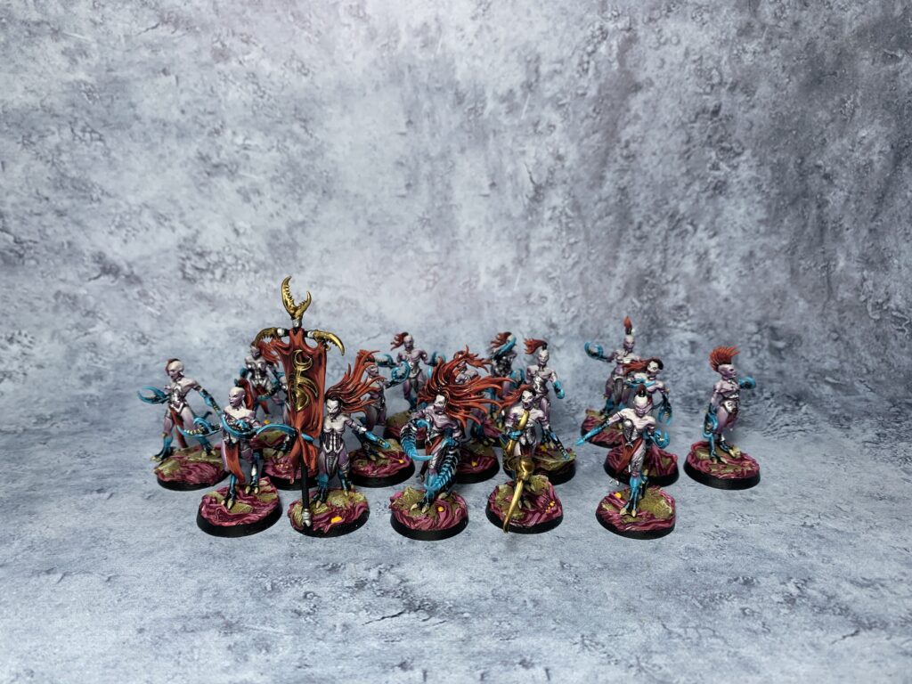 Daemons of Slaanesh in sea blue and pink colours