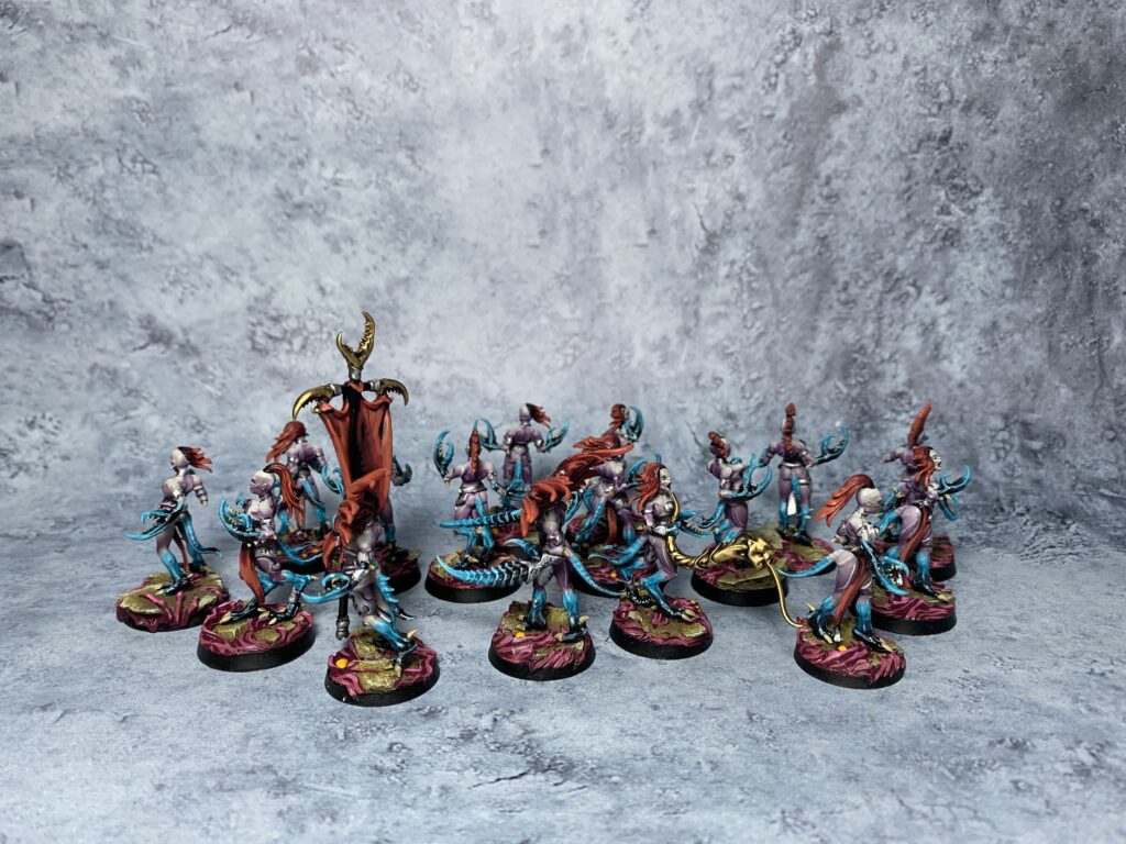 Daemons of Slaanesh in sea blue and pink colours