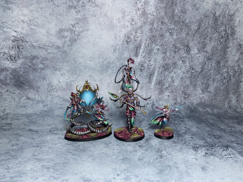 Daemons of Slaanesh in sea blue and pink colours