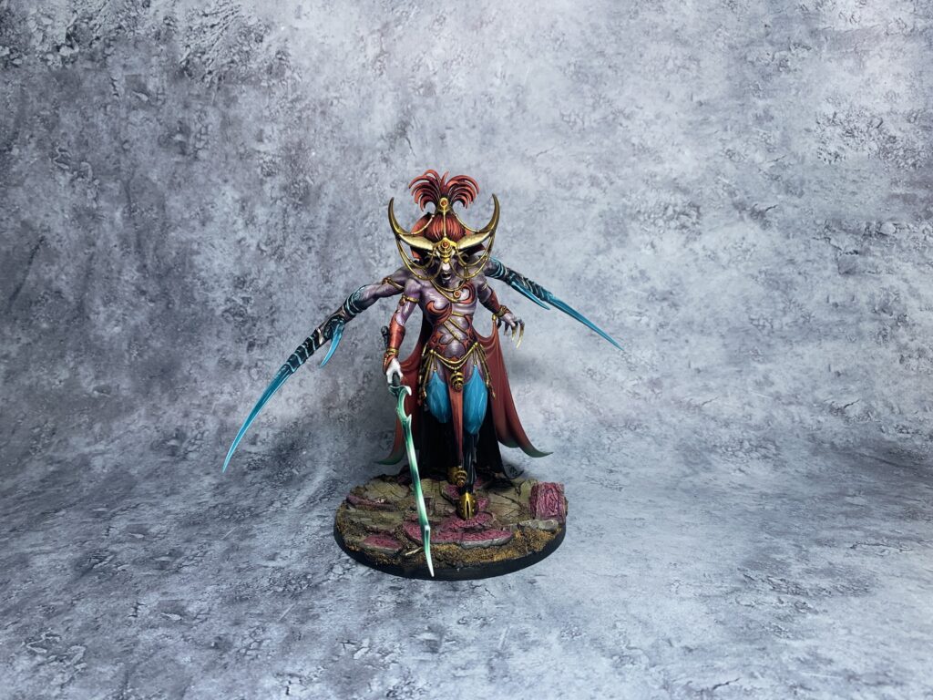 Daemons of Slaanesh in sea blue and pink colours