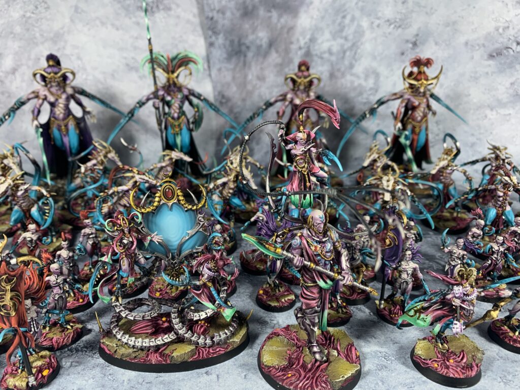 Daemons of Slaanesh in sea blue and pink colours