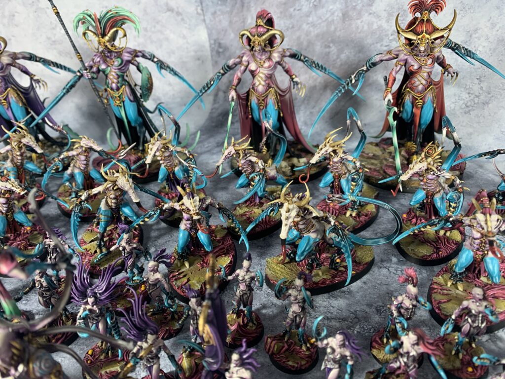 Daemons of Slaanesh in sea blue and pink colours